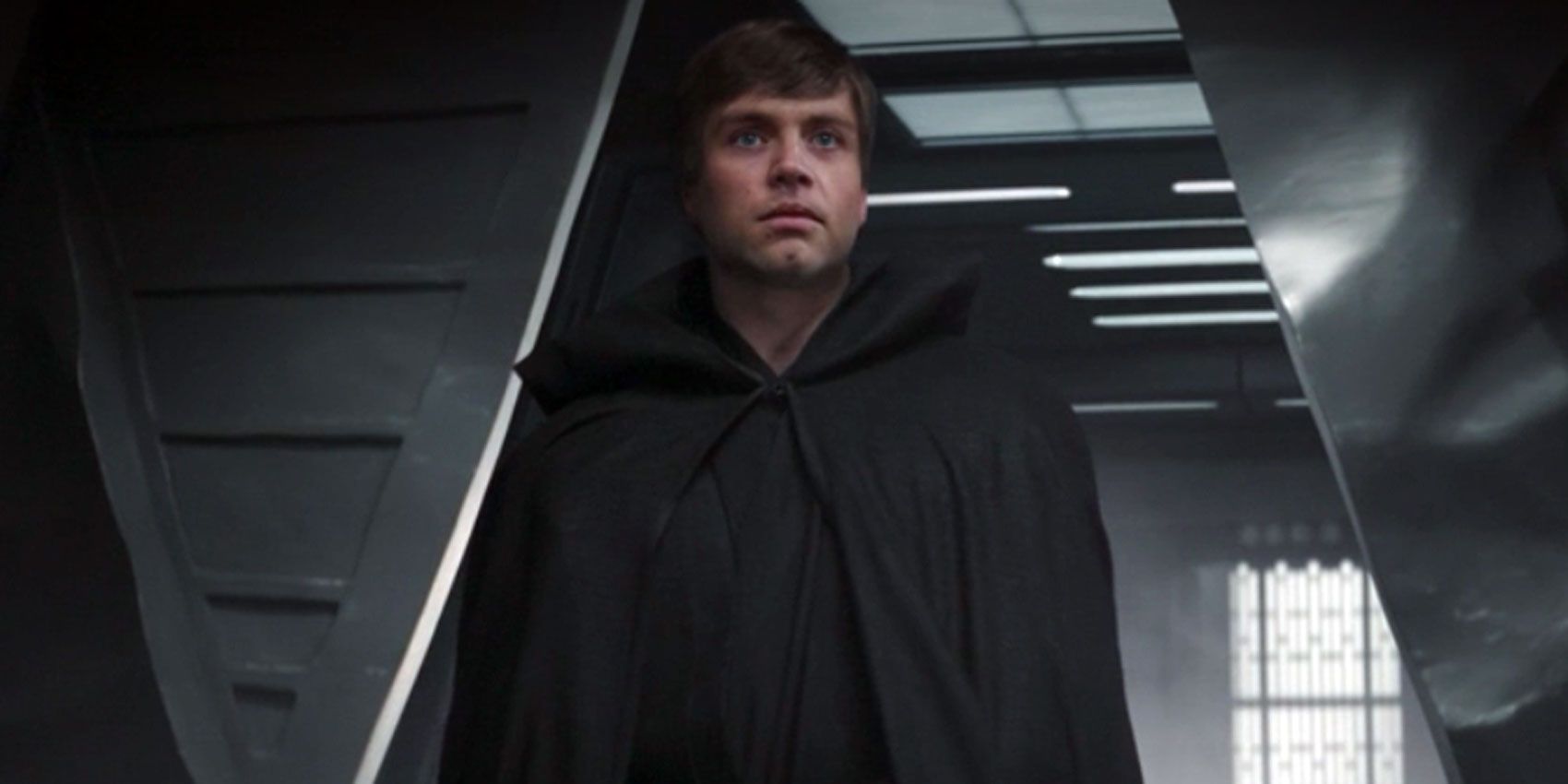 Luke Skywalker stands aboard Moff Gideon's light cruiser.