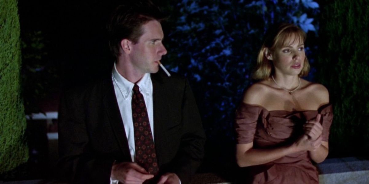 Josh Hamilton as Grover smoking with Olivia d'Abo as Jane in Kicks and Scream (1995)