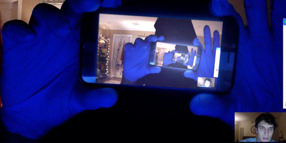 Someone holds the phone up to the webcam in Unfriended: Dark Web