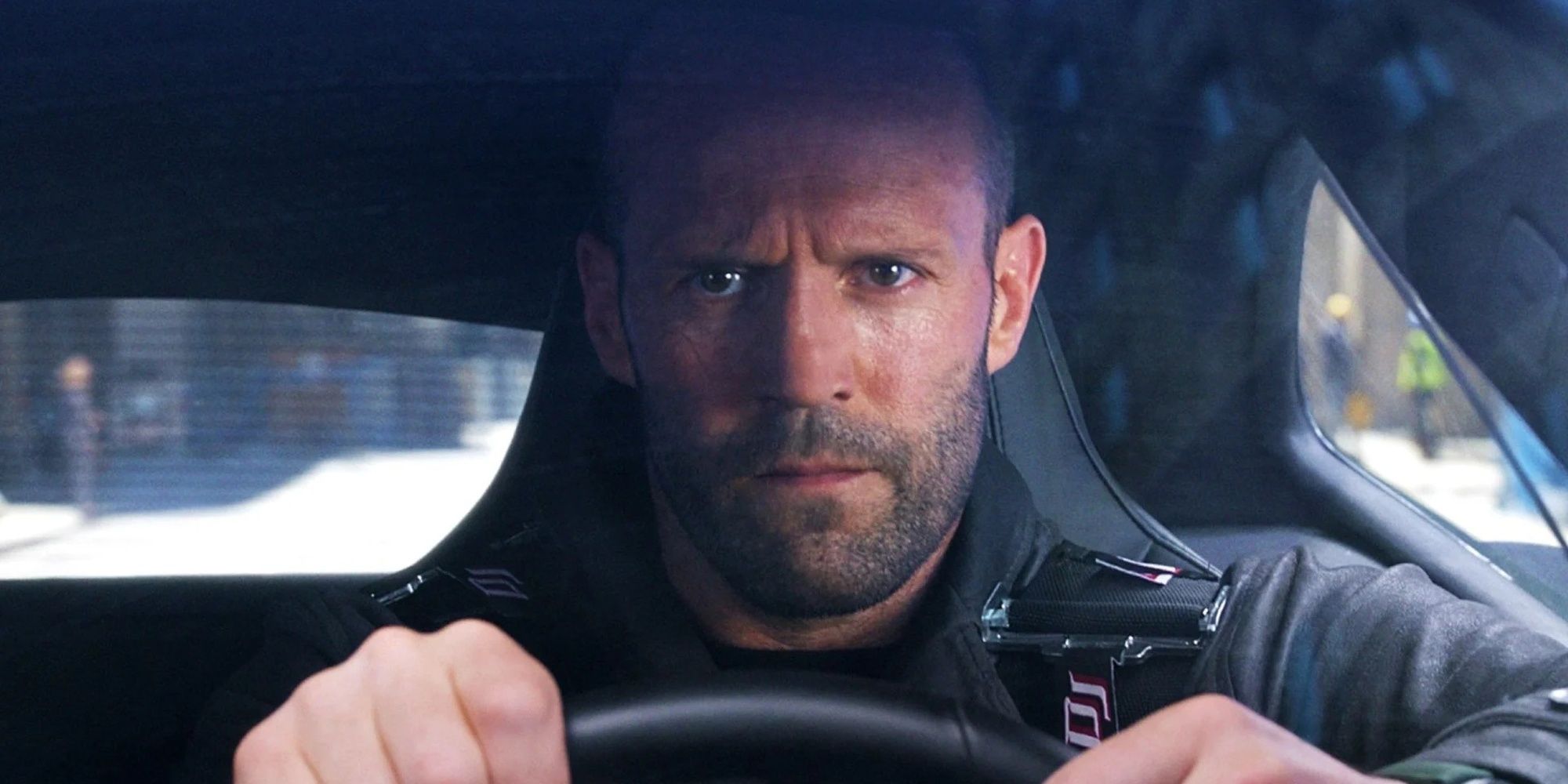 Jason Statham driving a car in Fast & Furious