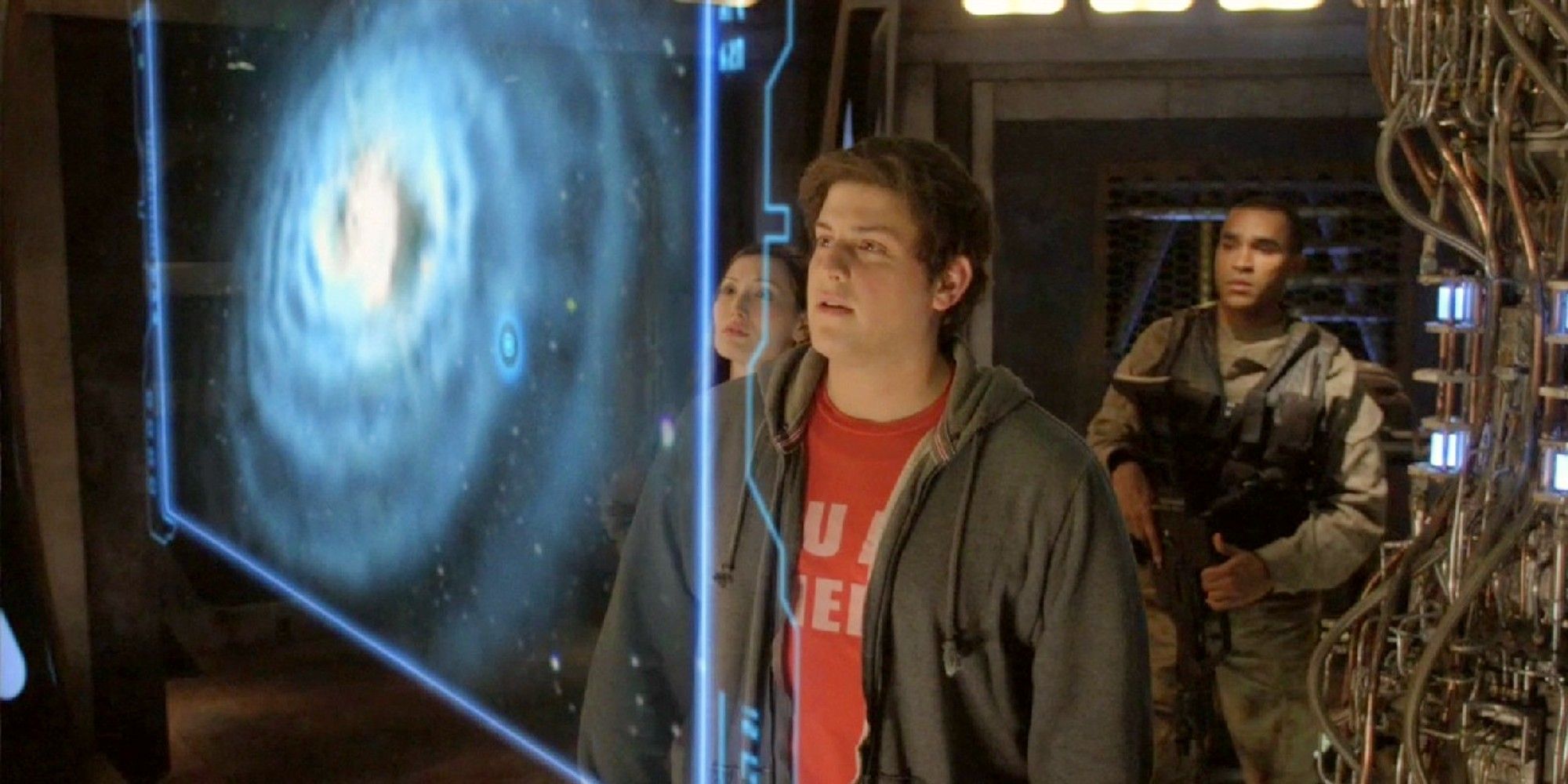 Eli Wallace on the Destiny spaceship watching video from the galaxy