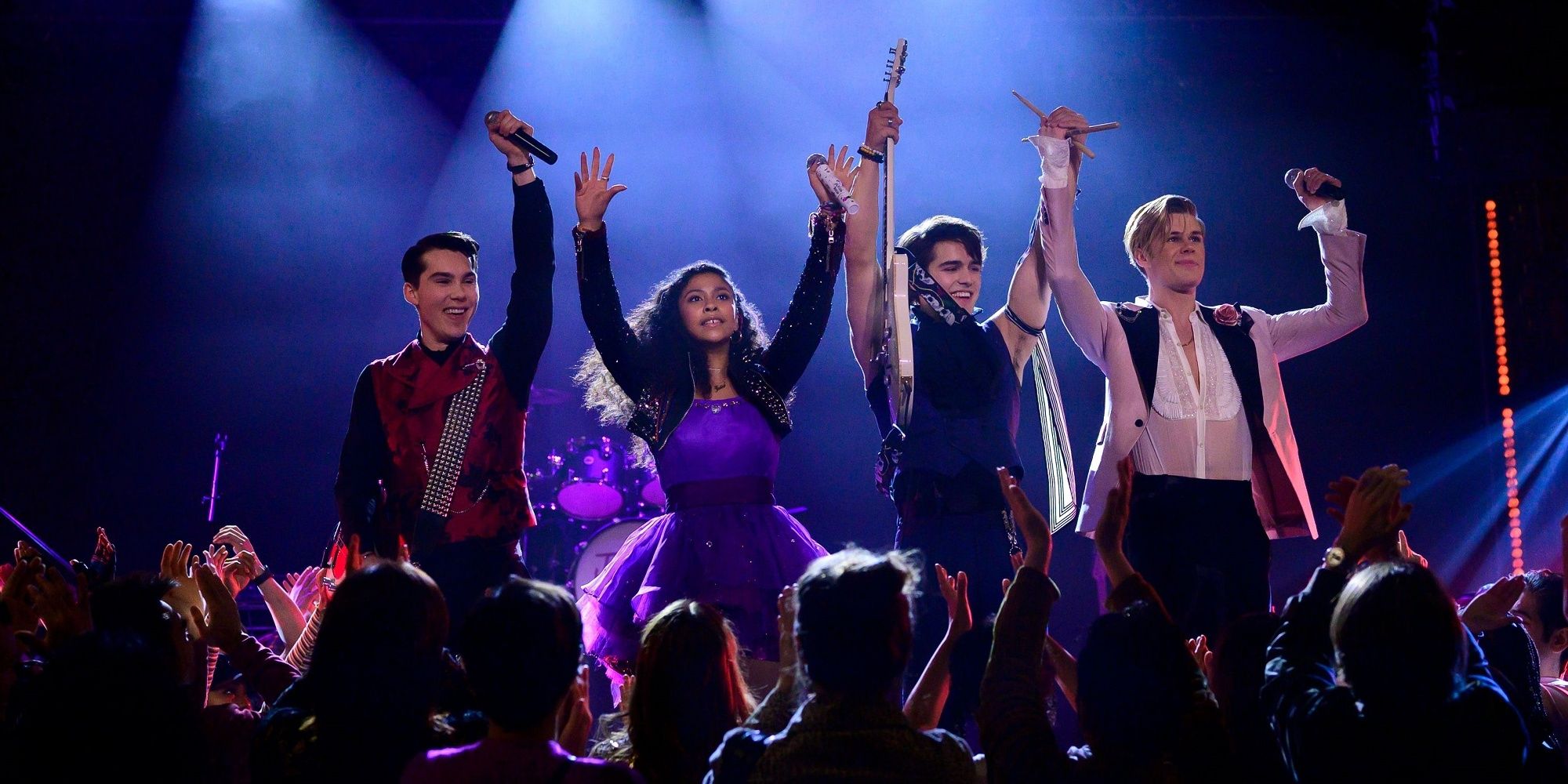 Group of teenagers celebrating on stage