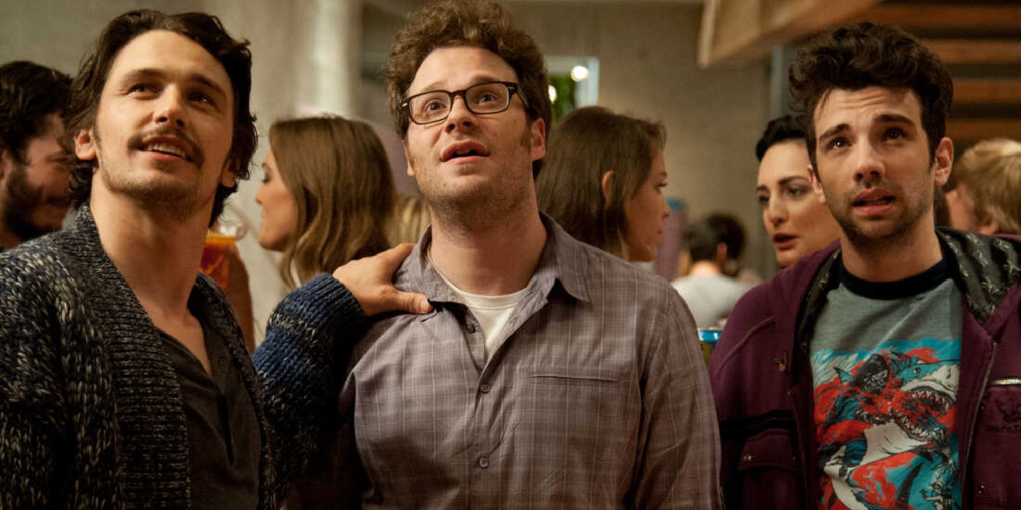 James Franco, Seth Rogen and Jay Baruchel looking up 
