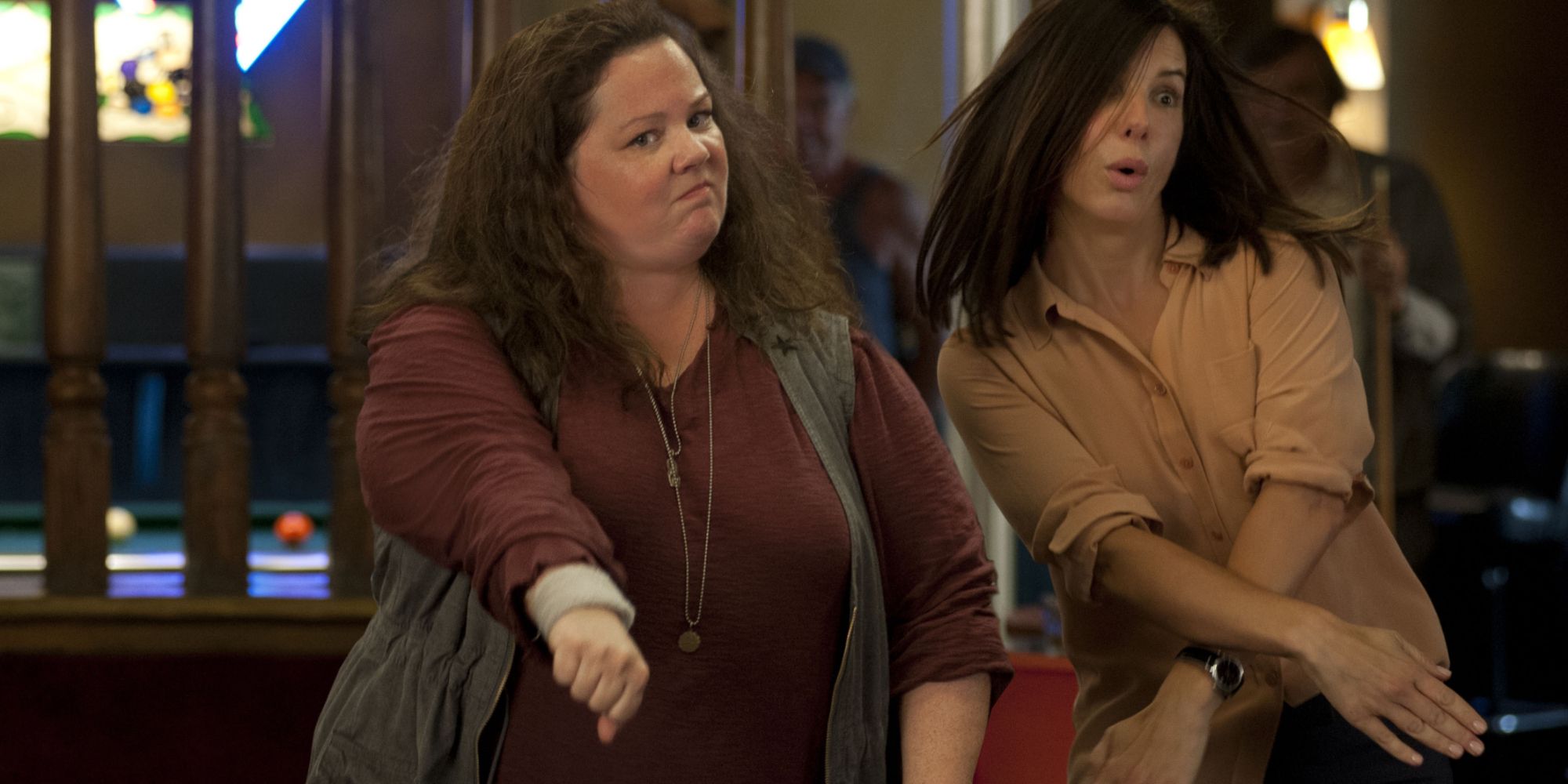 Melissa McCarthy and Sandra Bullock dancing 