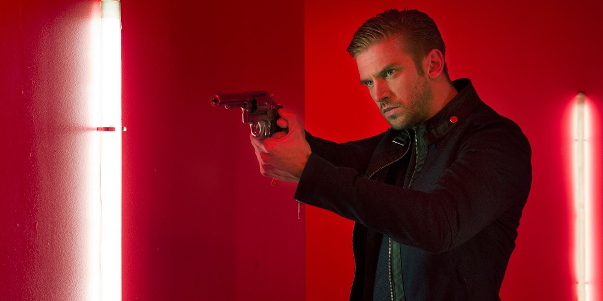Dan Stevens with a gun in The Guest