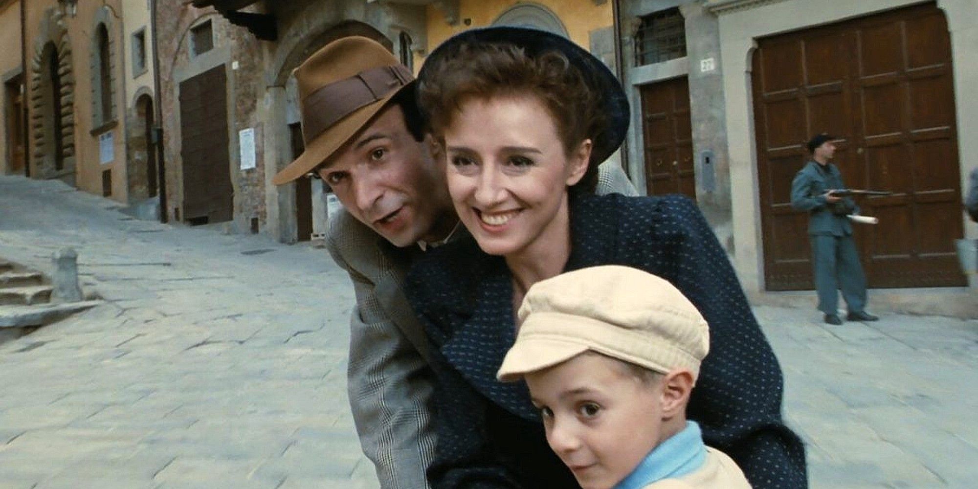 Roberto Benigni, Nicoletta Braschi and Giorgio Cantarini in Life is Beautiful