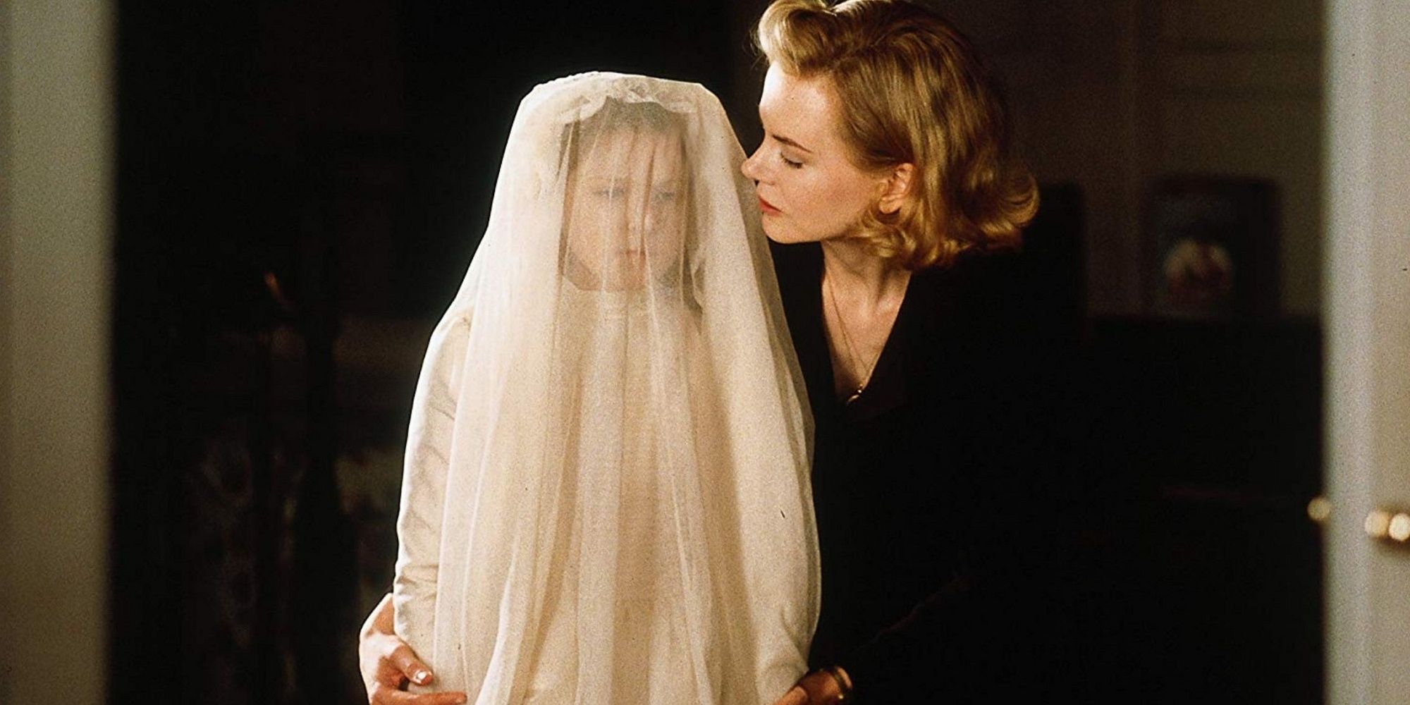 Nicole Kidman as Grace with her daughter Ann in The Others.