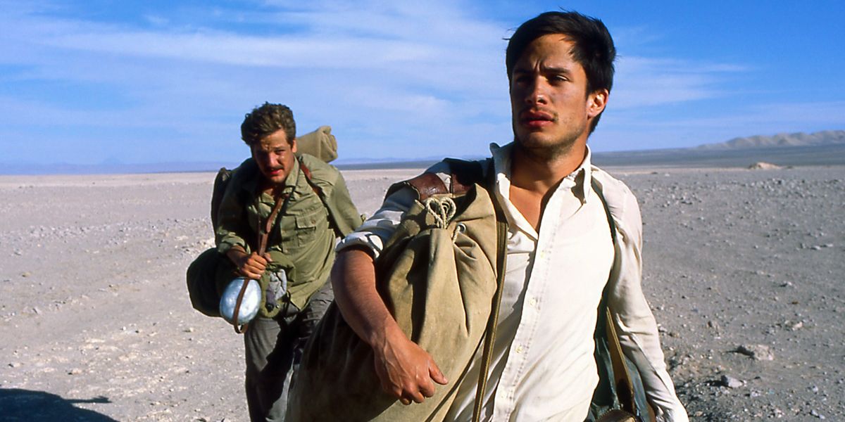 Gael Garcia Bernal and Rodrigo de la Serna as Che Guevara and Alberto Granados walk through the desert in motorcycle diaries.