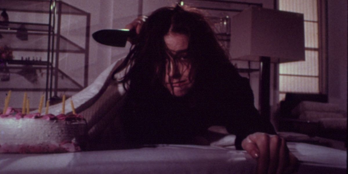 Woman on the floor with a knife