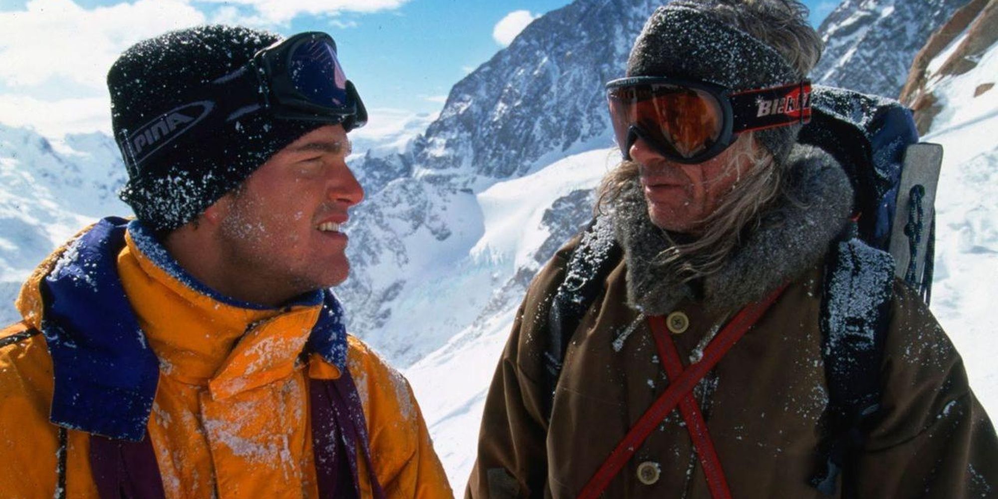Two men talking on a frozen mountain