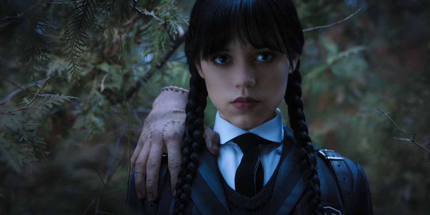 Jenna Ortega's Wednesday with Thing on her Shoulder on Netflix's Wednesday