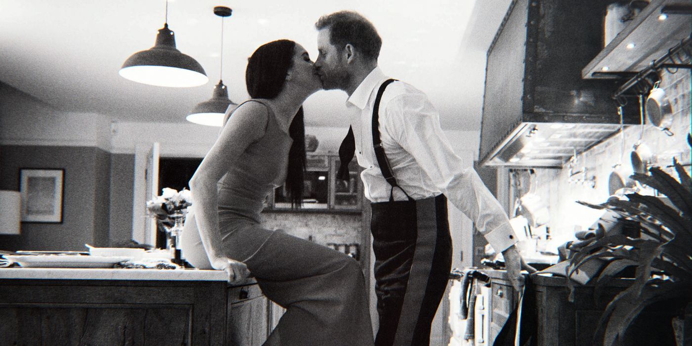 Prince Harry and Meghan Markle kiss in the kitchen