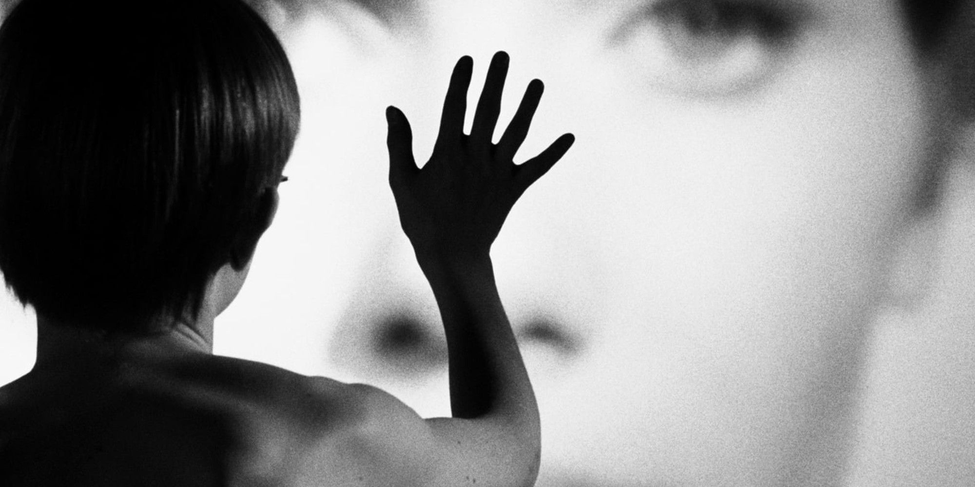 The boy looks at the woman in Persona.