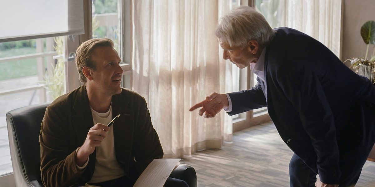 Jason Segel and Harrison Ford talking in a scene from Shrink