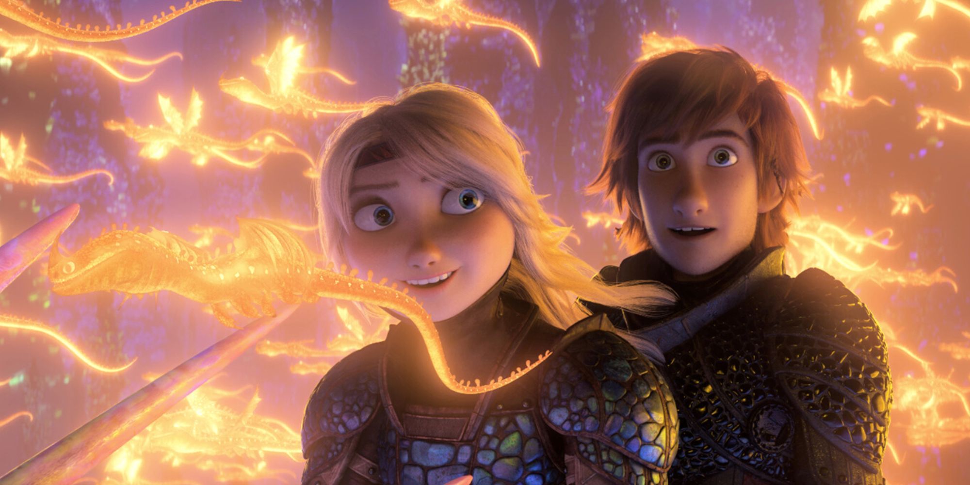 Hiccup and Astrid fly through a swarm of small golden dragons flying around them in How to Train Your Dragon: The Hidden World.