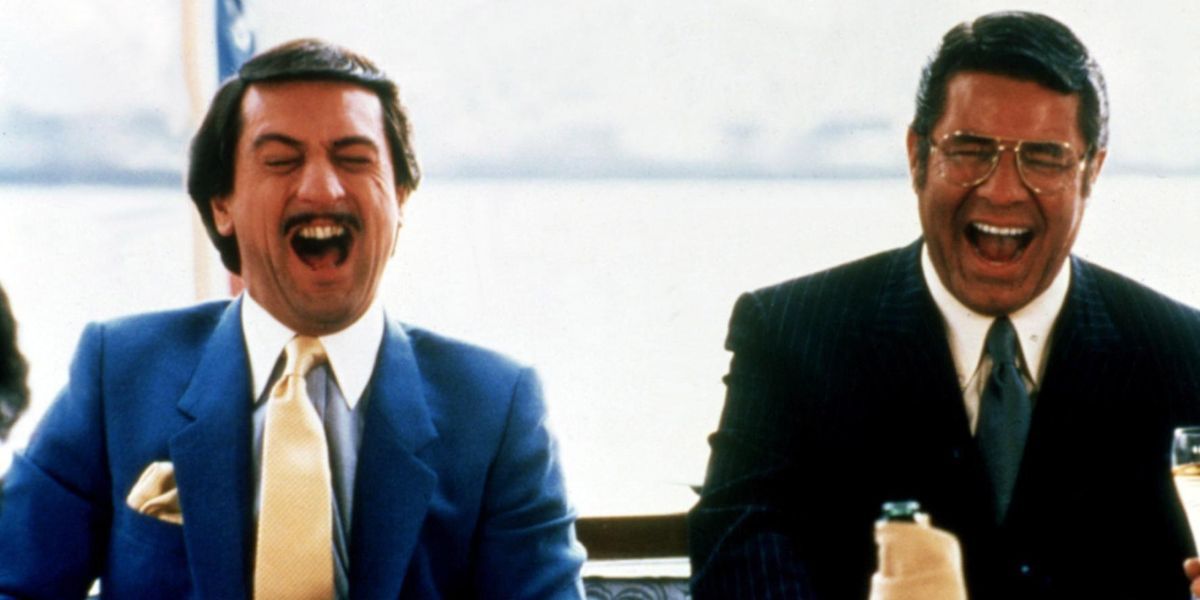 Rupert Pupkin, played by Robert De Niro, and Jerry Langford, played by Jerry Lewis, laugh hysterically in The King of Comedy.