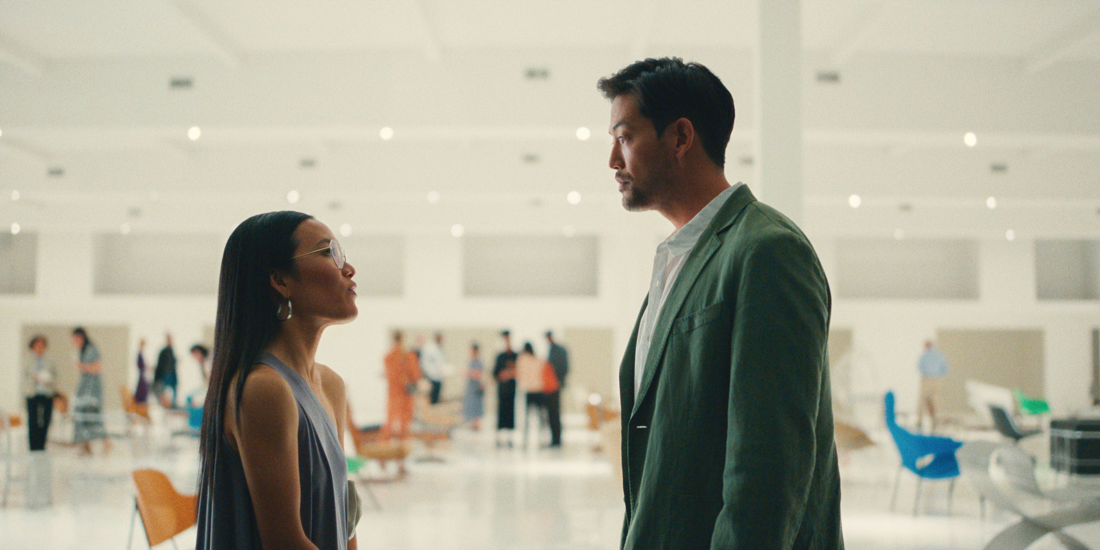 Ali Wong as Amy Lau talking to a man at BEEF