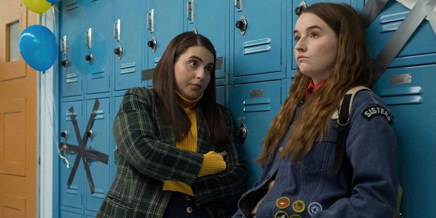 Beanie Feldstein and Caitlin Denver as Molly and Amy walk away from the lockers at Booksmart.