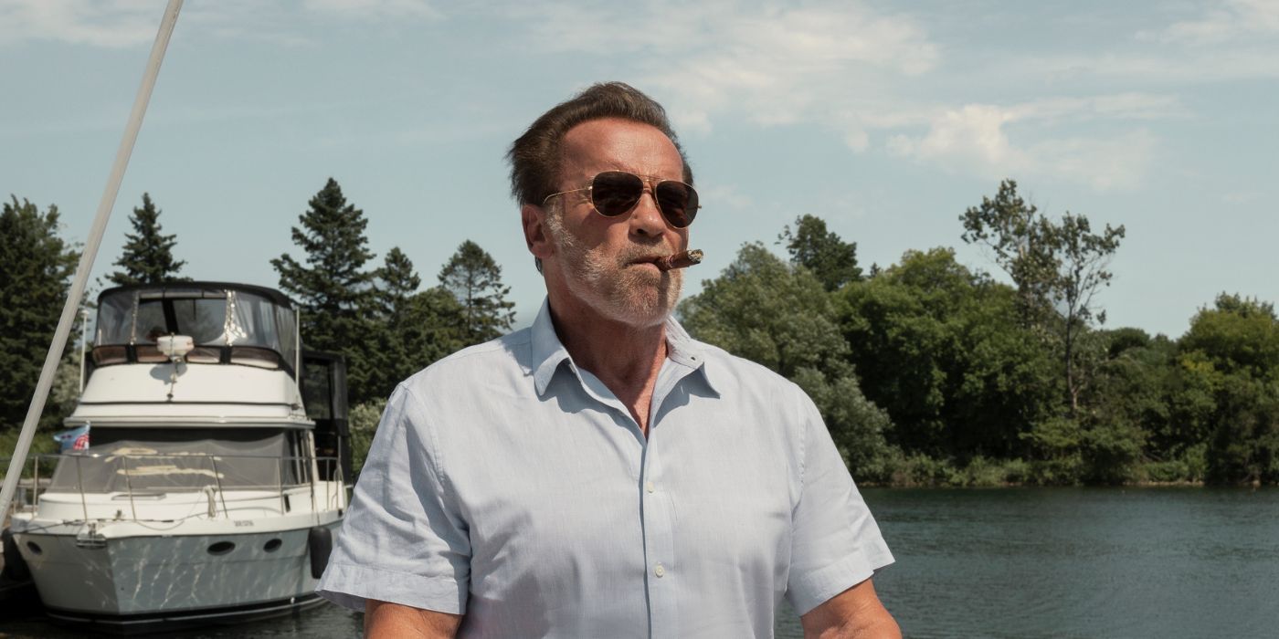 Arnold Schwarzenger as Luke Brunner smokes a cigar on a yacht in FUBAR.