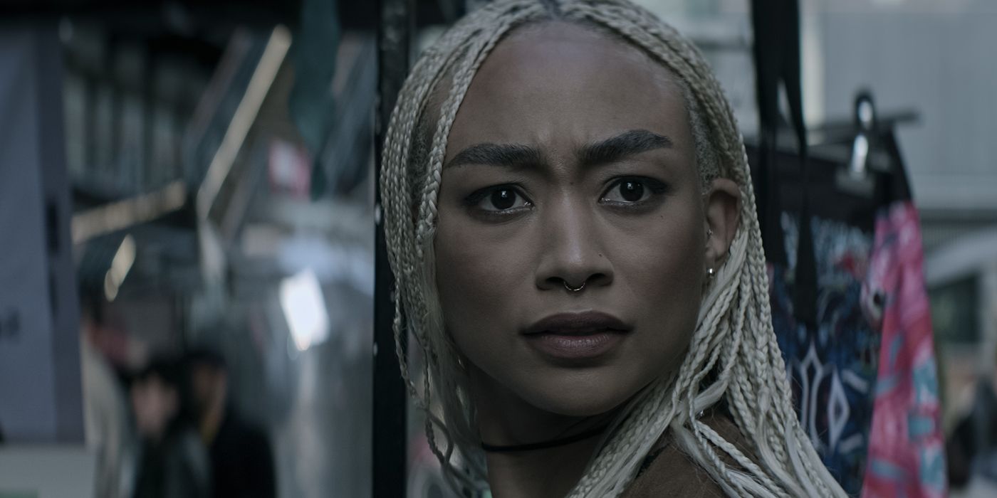 A close-up of Marienne with blond dreadlocks looking frightened and puzzled in Season 4 of You.