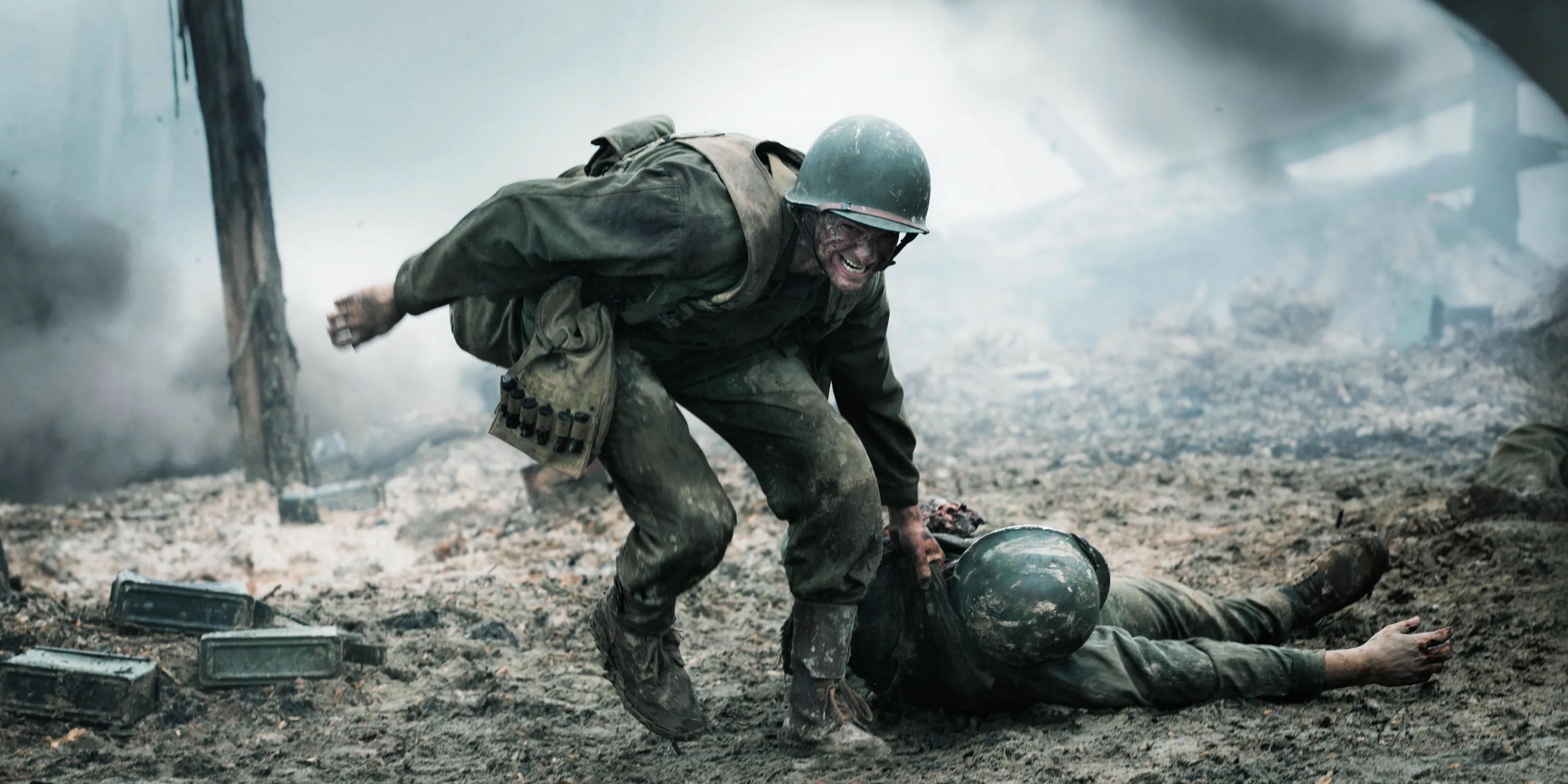 Andrew Garfield rescues a fallen soldier from the battlefield