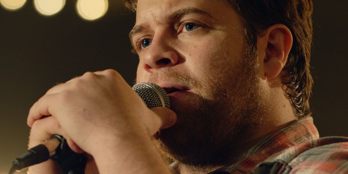 Close-up of Bart Millard singing into a microphone