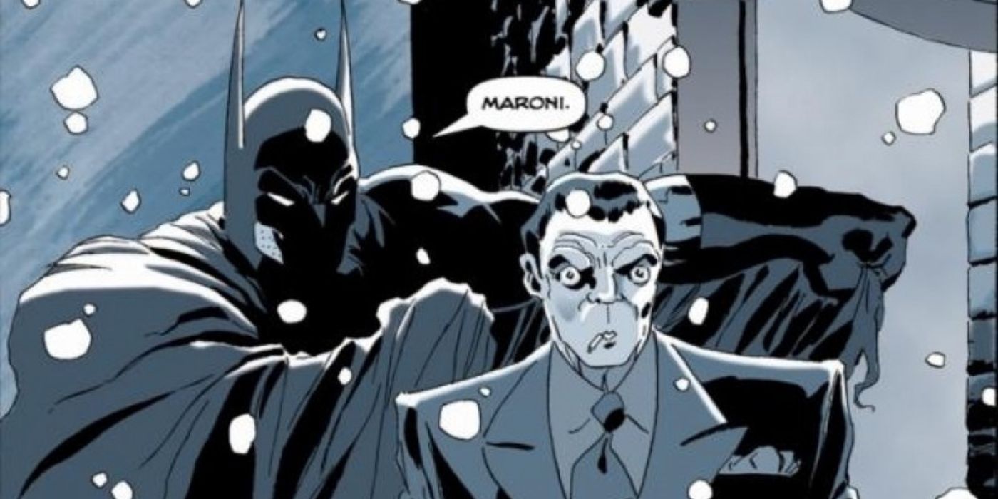 DC Comics' Sal Maroni looks horrified when Batman appears behind him and says his name.