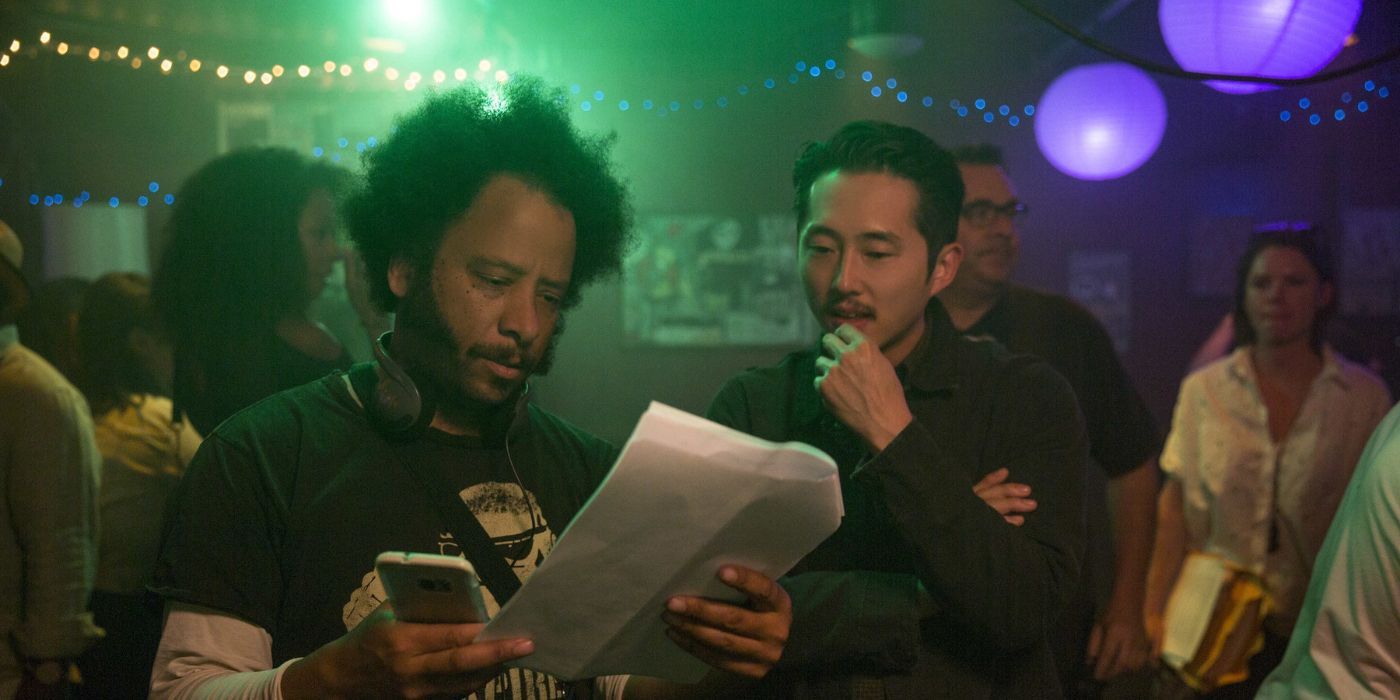 Boots Riley and Steven Yeun work together on the set of 'Sorry to Bother You'