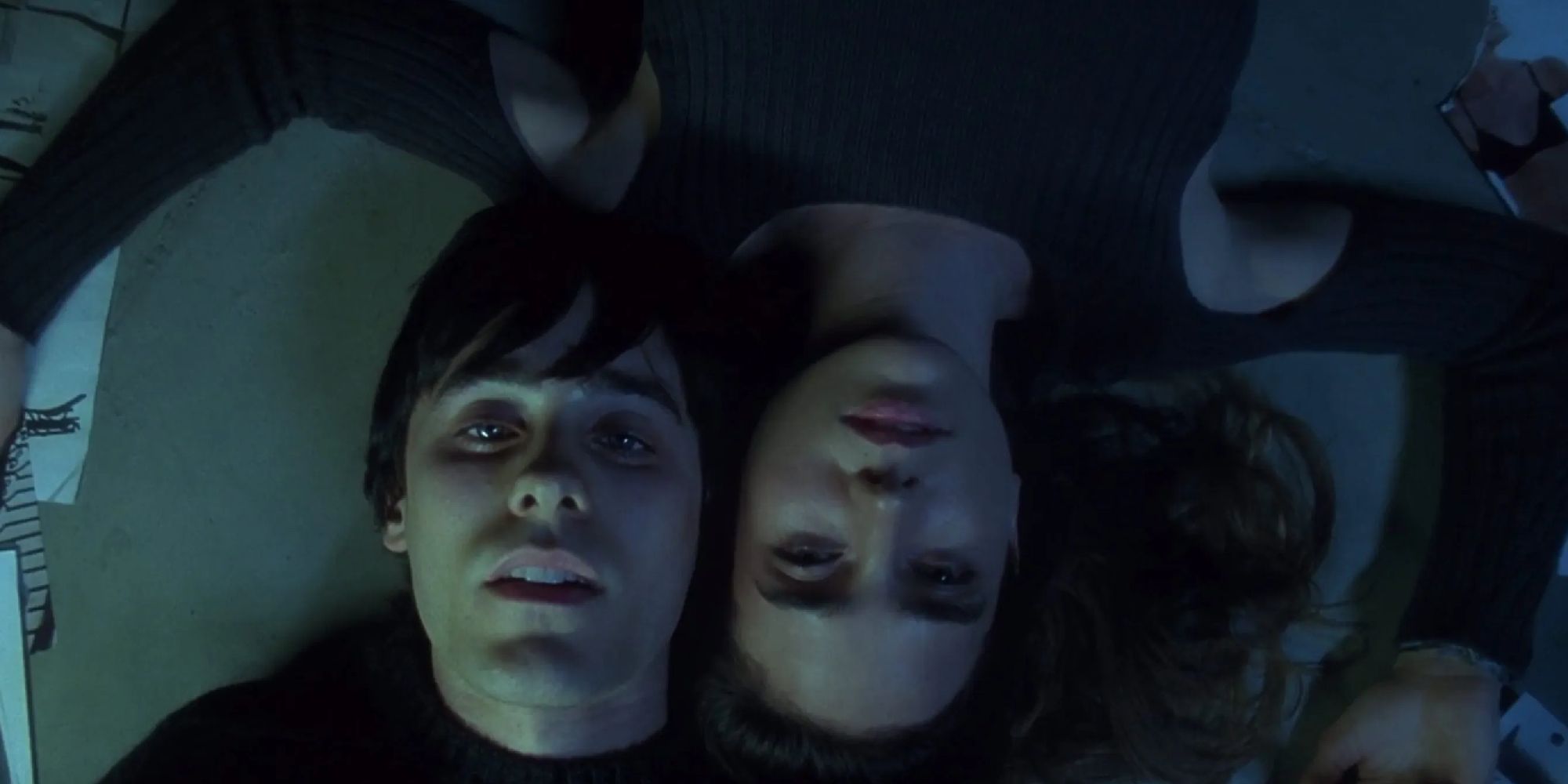 Jared Leto and Jennifer Connelly lie on the floor in Requiem for a Dream