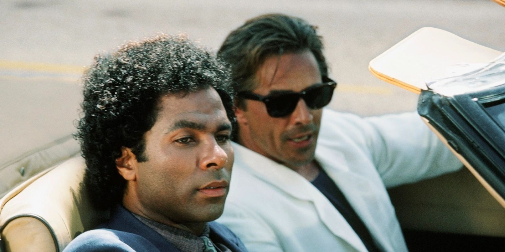 Philip Michael Thomas and Don Johnson in the Miami Police car.
