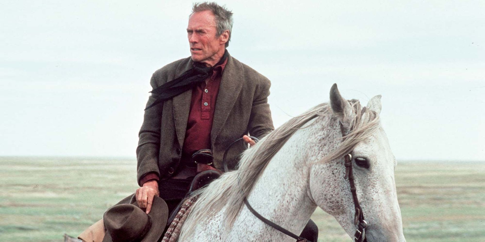Clint Eastwood as Bill Munny on horseback in Unforgiven, 1992.
