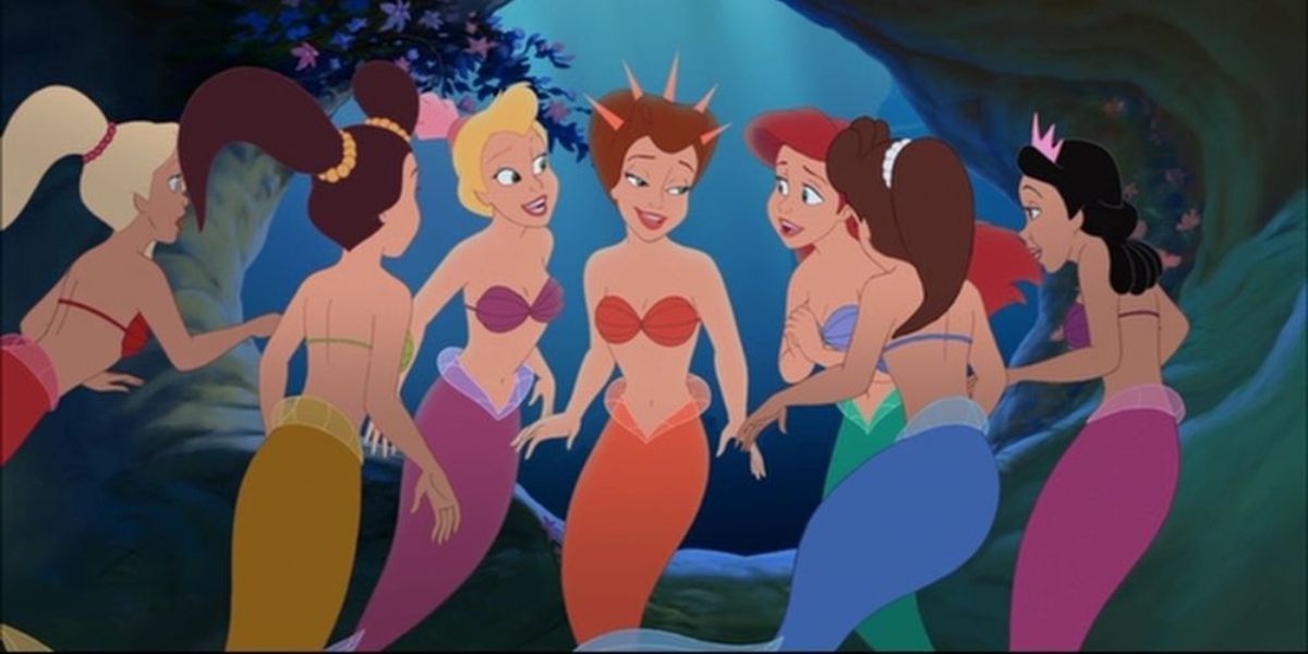 Jodi Benson as Ariel with her sisters in The Little Mermaid: Ariel Begins.