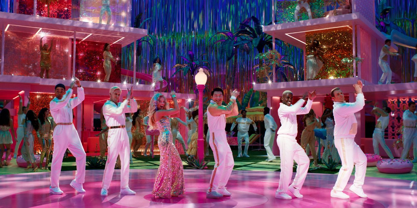 Margot Robbie as Barbie dances with Kingsley Ben-Adir, Ryan Gosling, Simu Liu, Nkuti Gatwa and Scott Evans as the Kens.