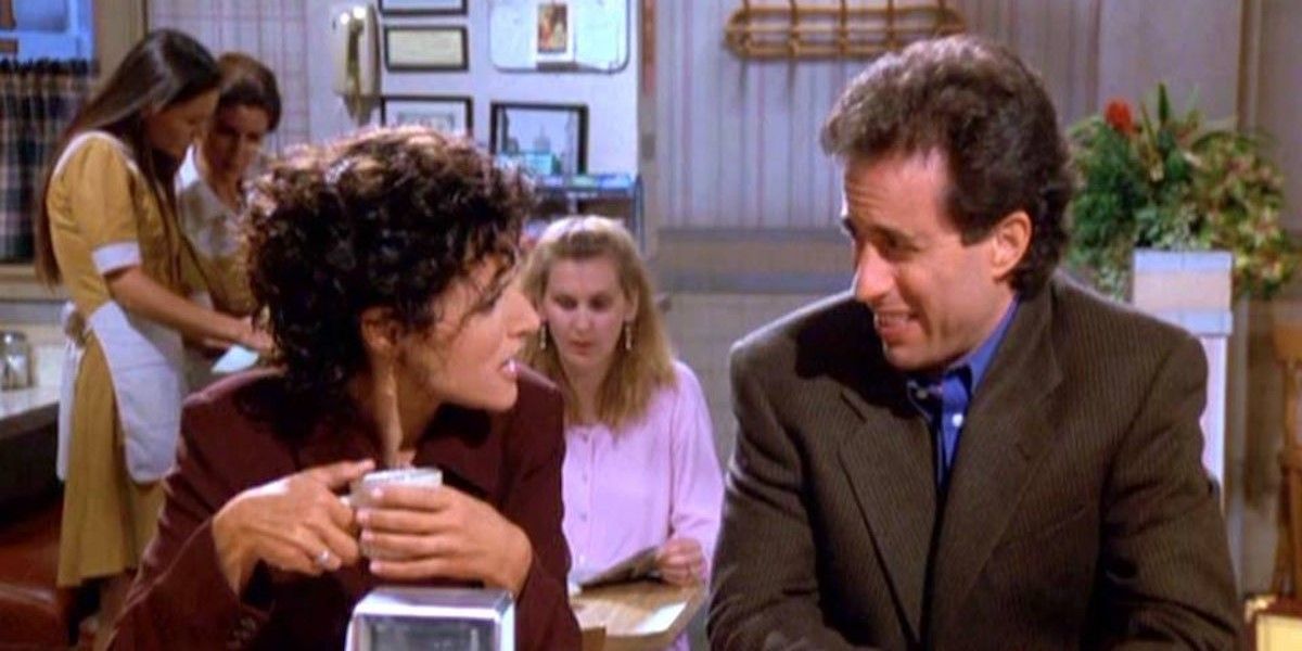 Elaine and Jerry talking about their new girlfriend at Seinfeld