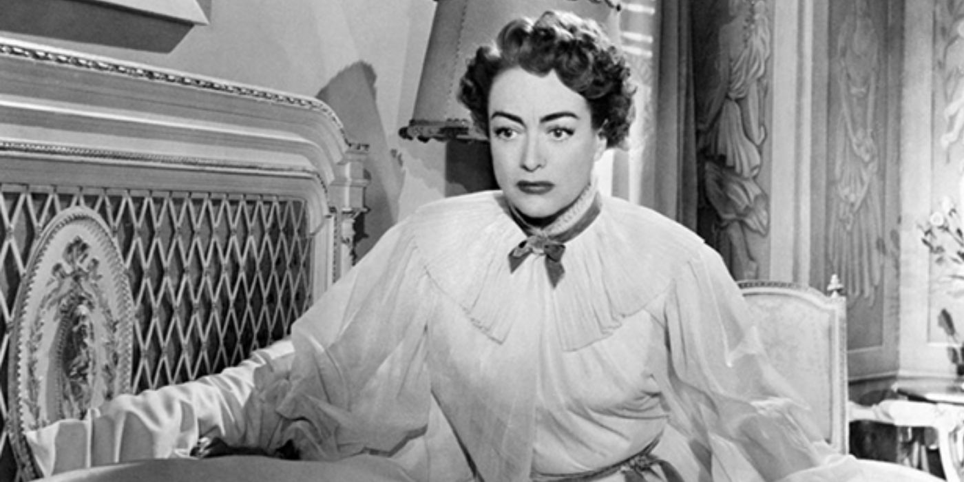 Joan Crawford sits on her bed in Sudden Fear.