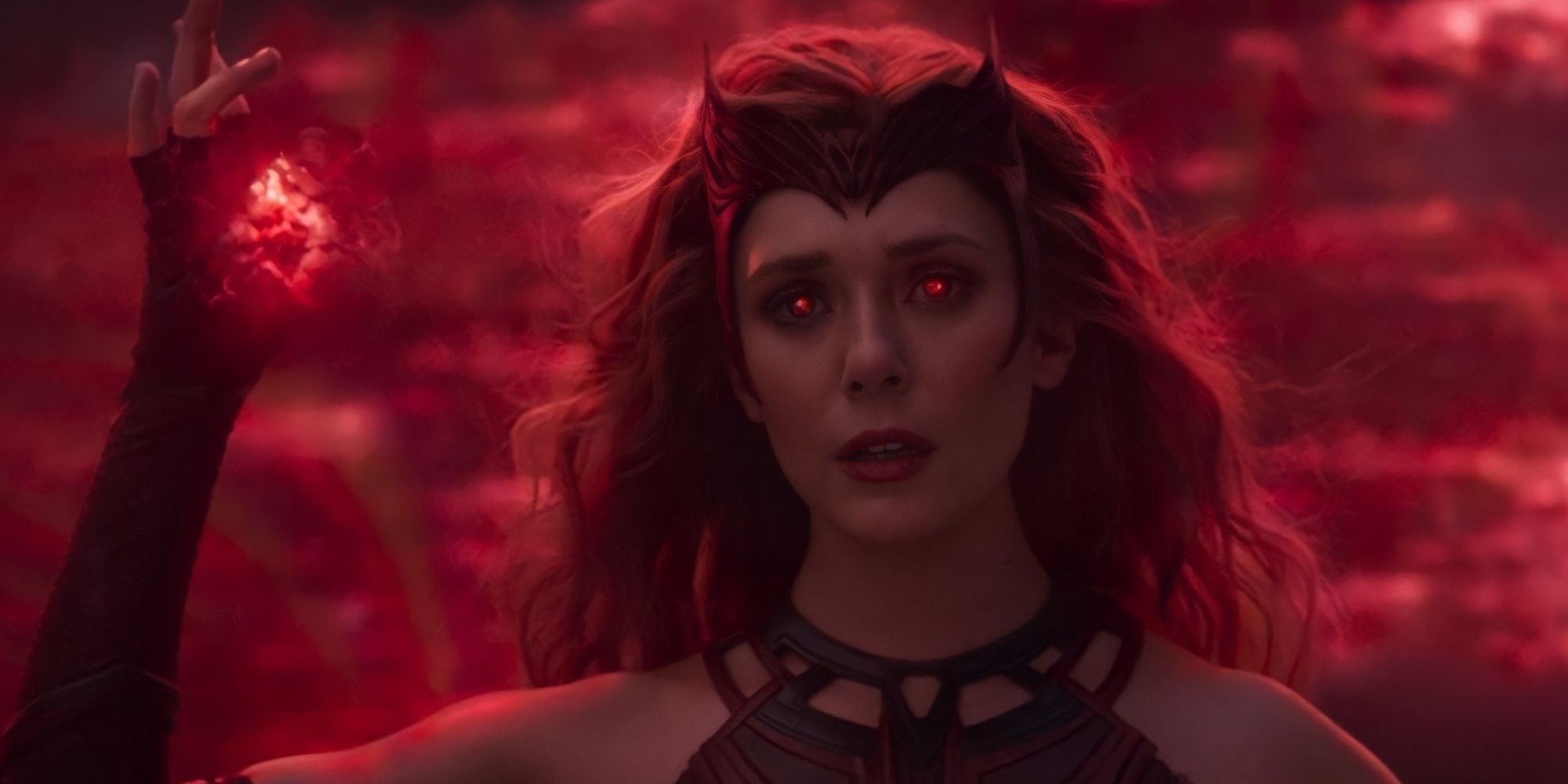 Elizabeth Olsen as Wanda unleashing her full powers as Scarlet Witch in the Disney+ series WandaVision.