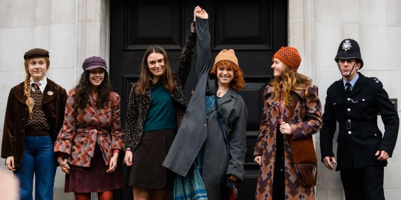 Group of women smiling and queuing at Misbehavior