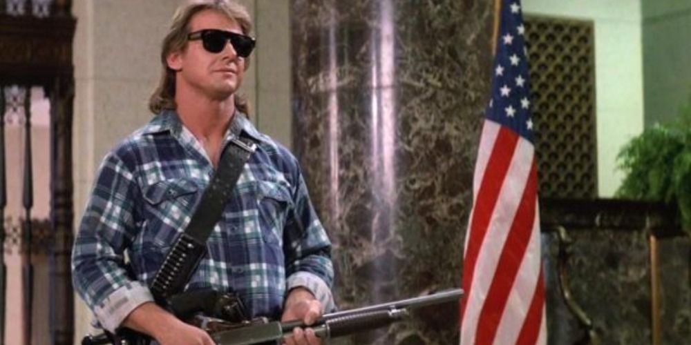 Roddy Piper with a shotgun in They Live.