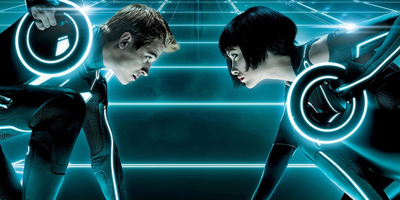 Garrett Hedlund and Olivia Wilde fight each other in Tron: Legacy.