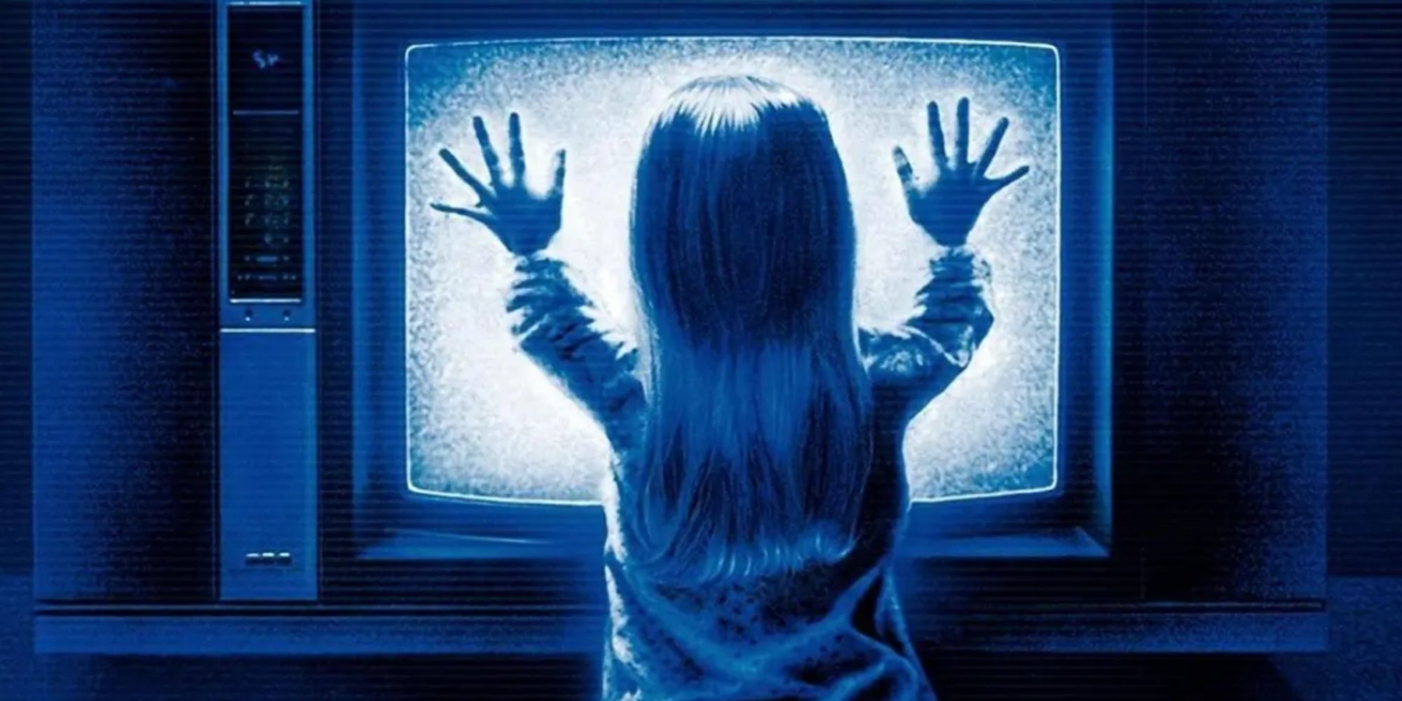 Child in front of the TV screen in a poltergeist