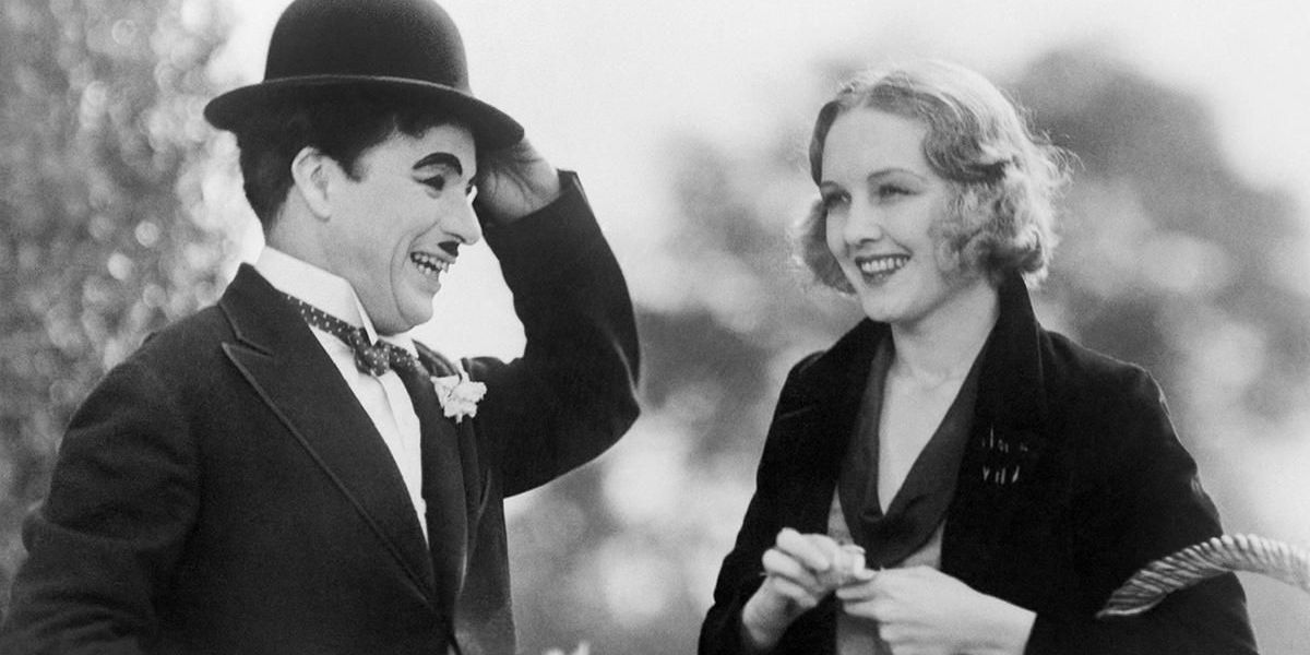 Charlie Chaplin and Virginia Cherrill as the Tramp and the smiling blind girl in City Lights.