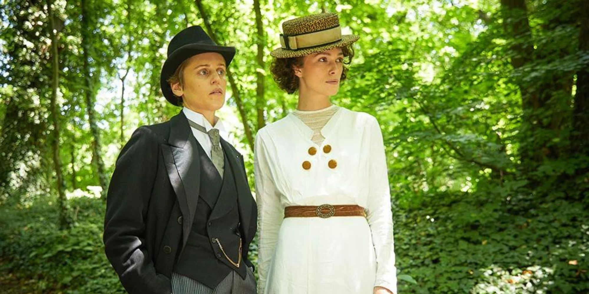 Colette and Missy are in the woods looking at Colette in the same direction.