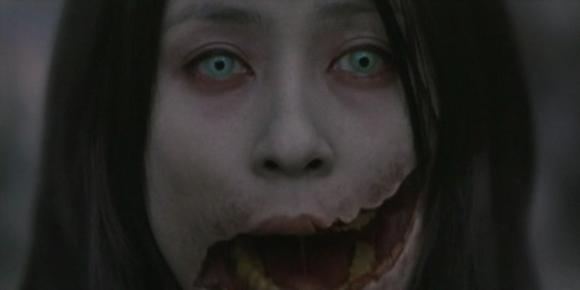Carved woman with slit mouth
