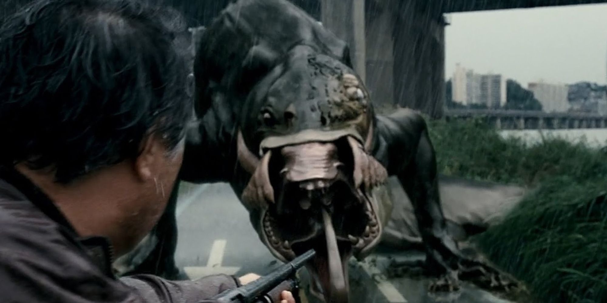 A man with a shotgun fights a gwoemul