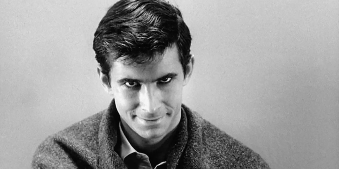 Creepy man smiling at camera