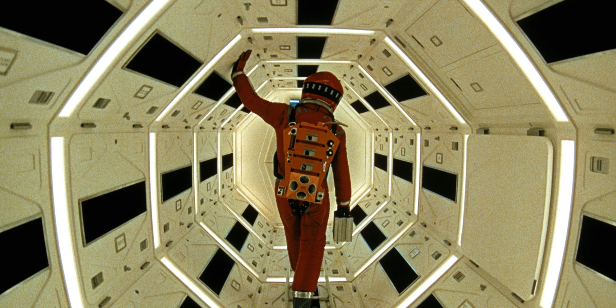 Astronaut works in a lighted room