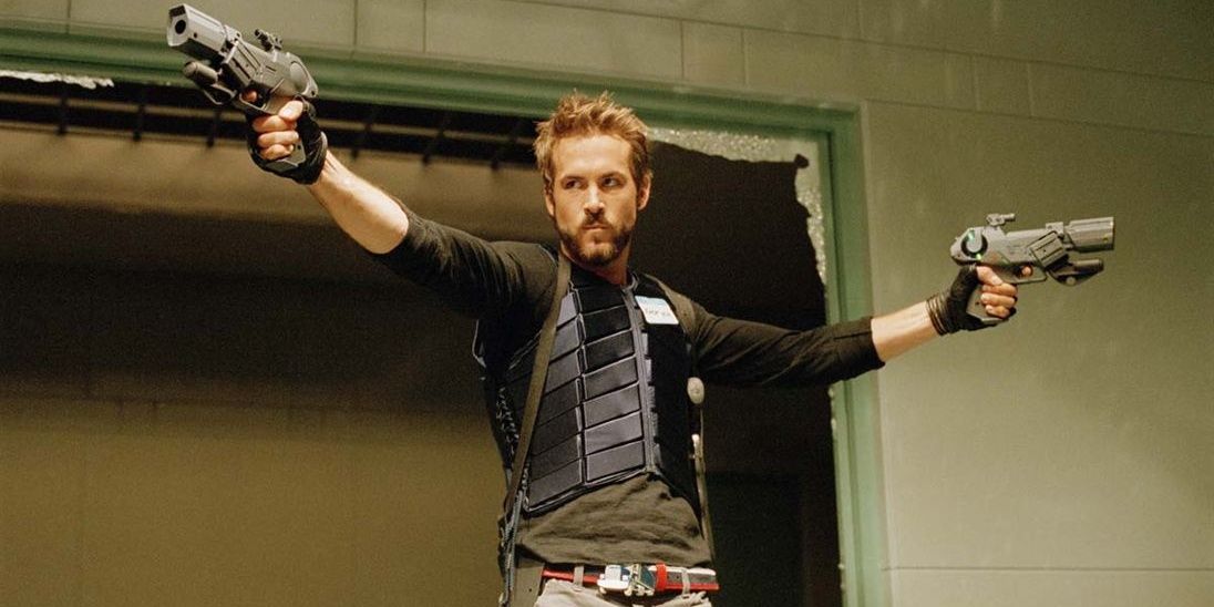 Ryan Reynolds with two guns in Blade Trinity