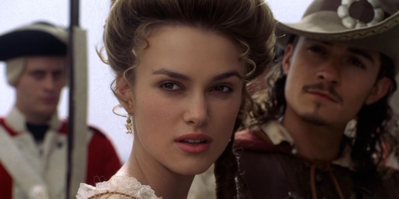 Elizabeth Swann turns to face someone in Pirates of the Caribbean.  Curse of the Black Pearl.