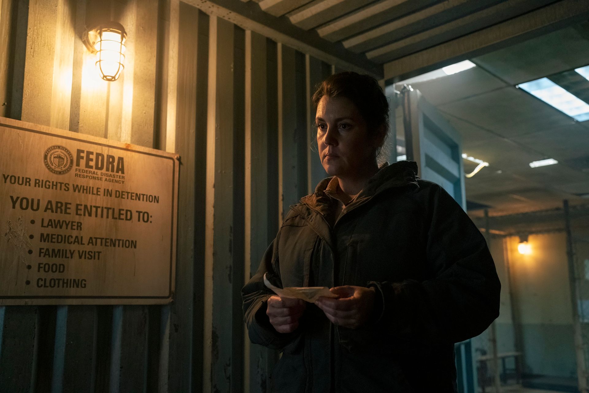 Melanie Lynskey as Kathleen interrogates someone in The Last of Us