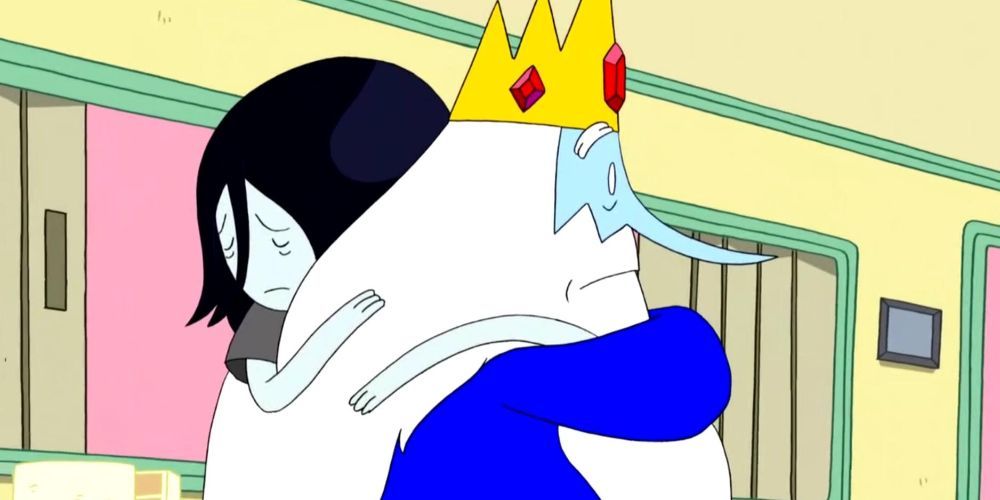 Vampire Queen Marceline hugs Ice King Simon.